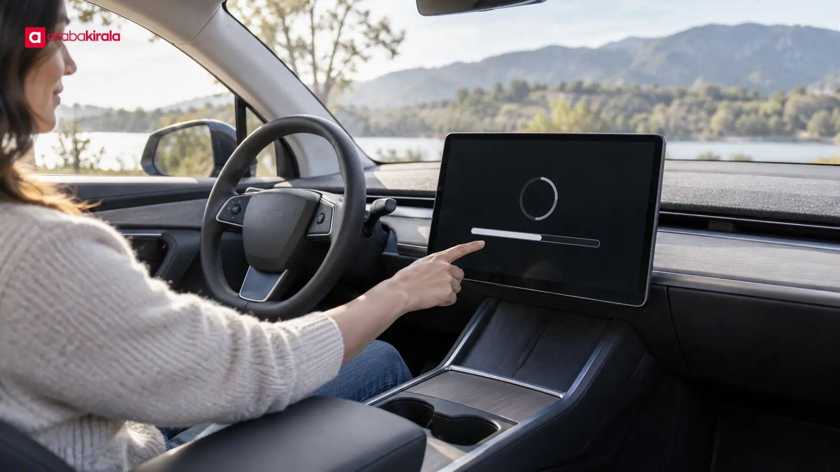 Park halindeki elektrikli aracın ekranında yazılım güncelleme göstergesi Park halindeki elektrikli aracın ekranında yazılım güncelleme göstergesi